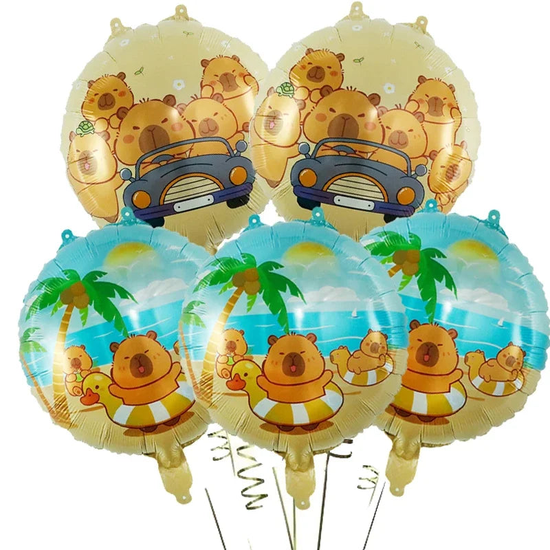 A set of yellow and blue foil balloons featuring cartoon capybaras for parties