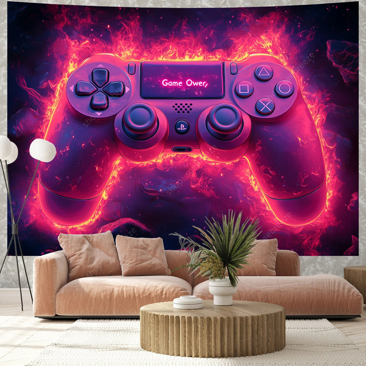 A purple and pink UV reactive game controller tapestry displayed on a sofa.