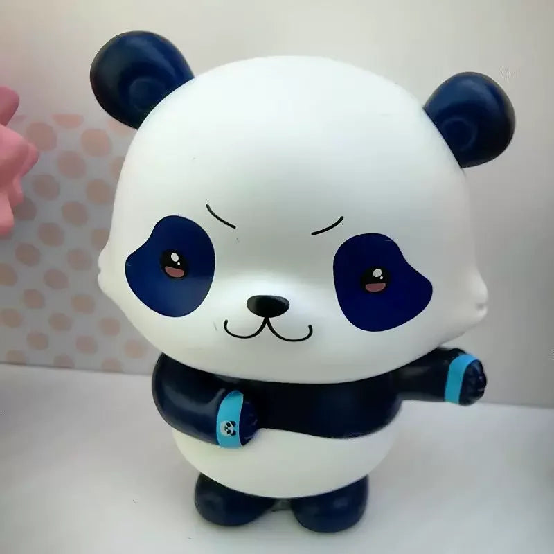 A white and blue blind box collectible figure of Gojo and Geto pandas.
