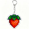 Acrylic keychain charm shaped like a strawberry with green leaves and a silver split ring.