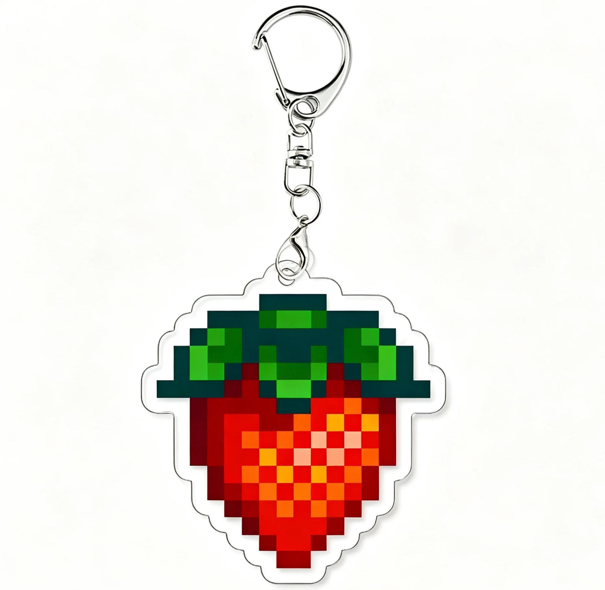 Acrylic keychain charm shaped like a strawberry with green leaves and a silver split ring.