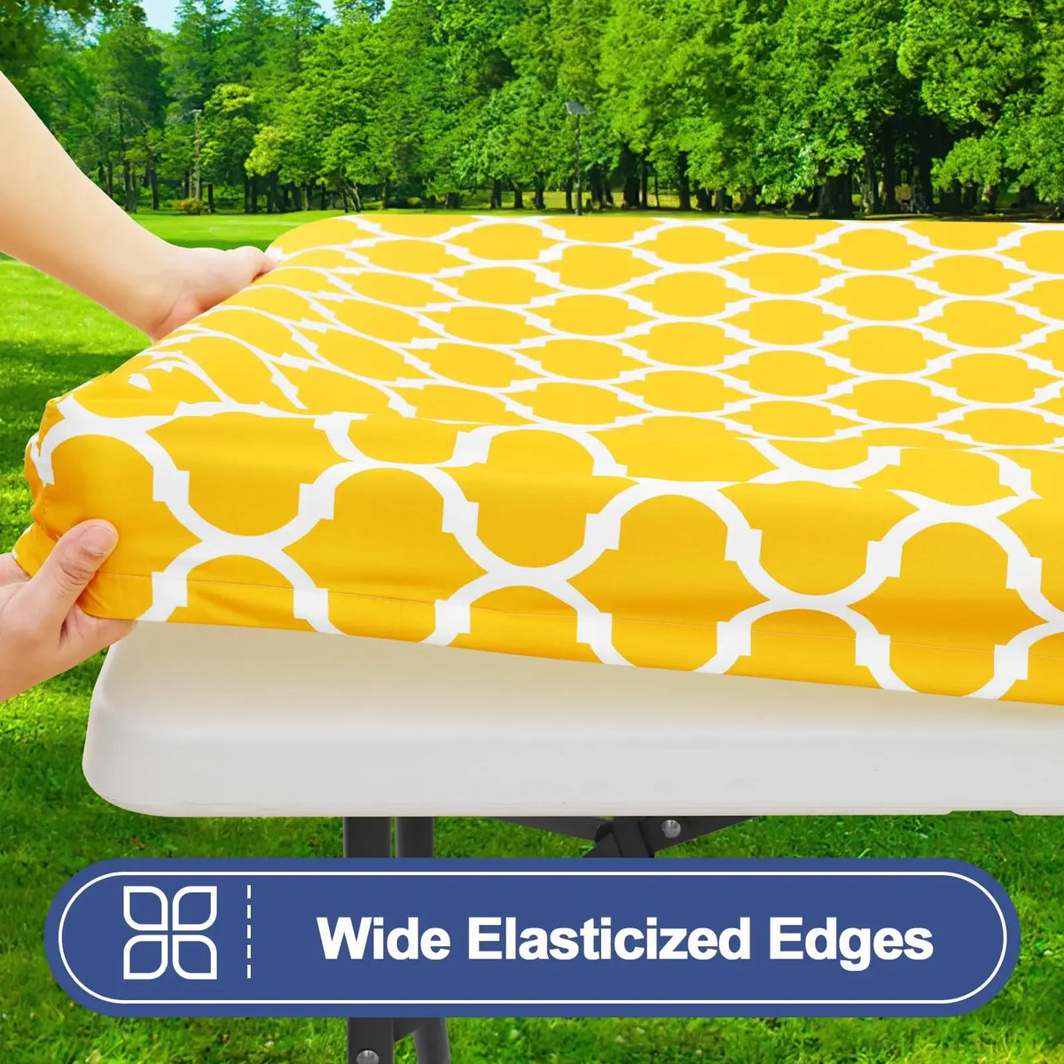 Yellow waterproof elastic fitted tablecloth covering a folding table outdoors.