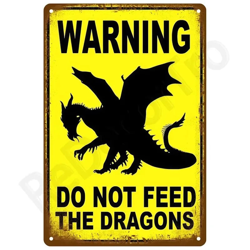 A vintage yellow warning sign with black text and a silhouette of a dragon, instructing not to feed the dragons.
