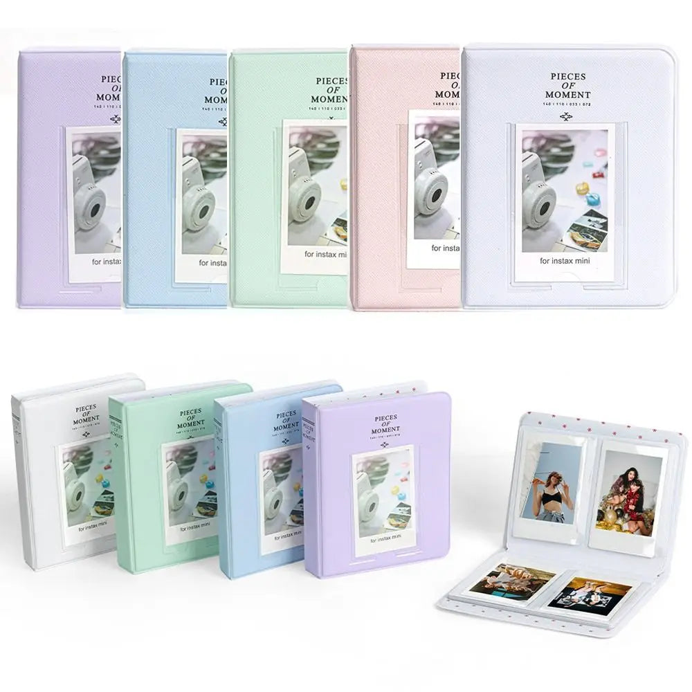 A set of five pastel-colored photo albums for instant cameras, featuring various sizes and designs.