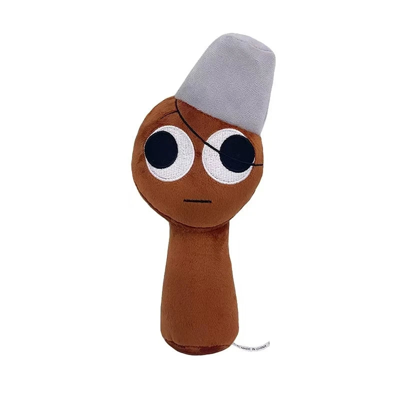 A brown plush toy with a gray cap and large black eyes.