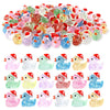 A large pile of glow-in-the-dark Christmas duck figurines wearing Santa hats in various colors.