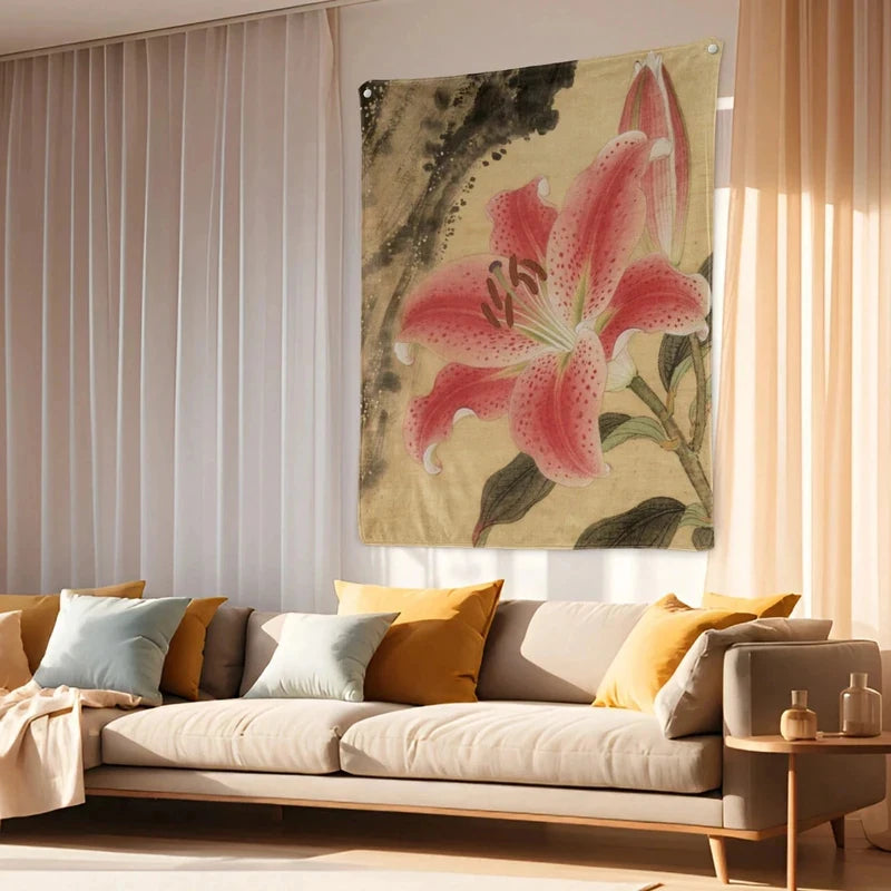 A large wall tapestry featuring a pink lily floral design hanging in a bright living room.