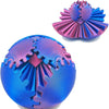 A close-up view of a blue 3D printed gear ball fidget spinner with intricate, spiky teeth designs.