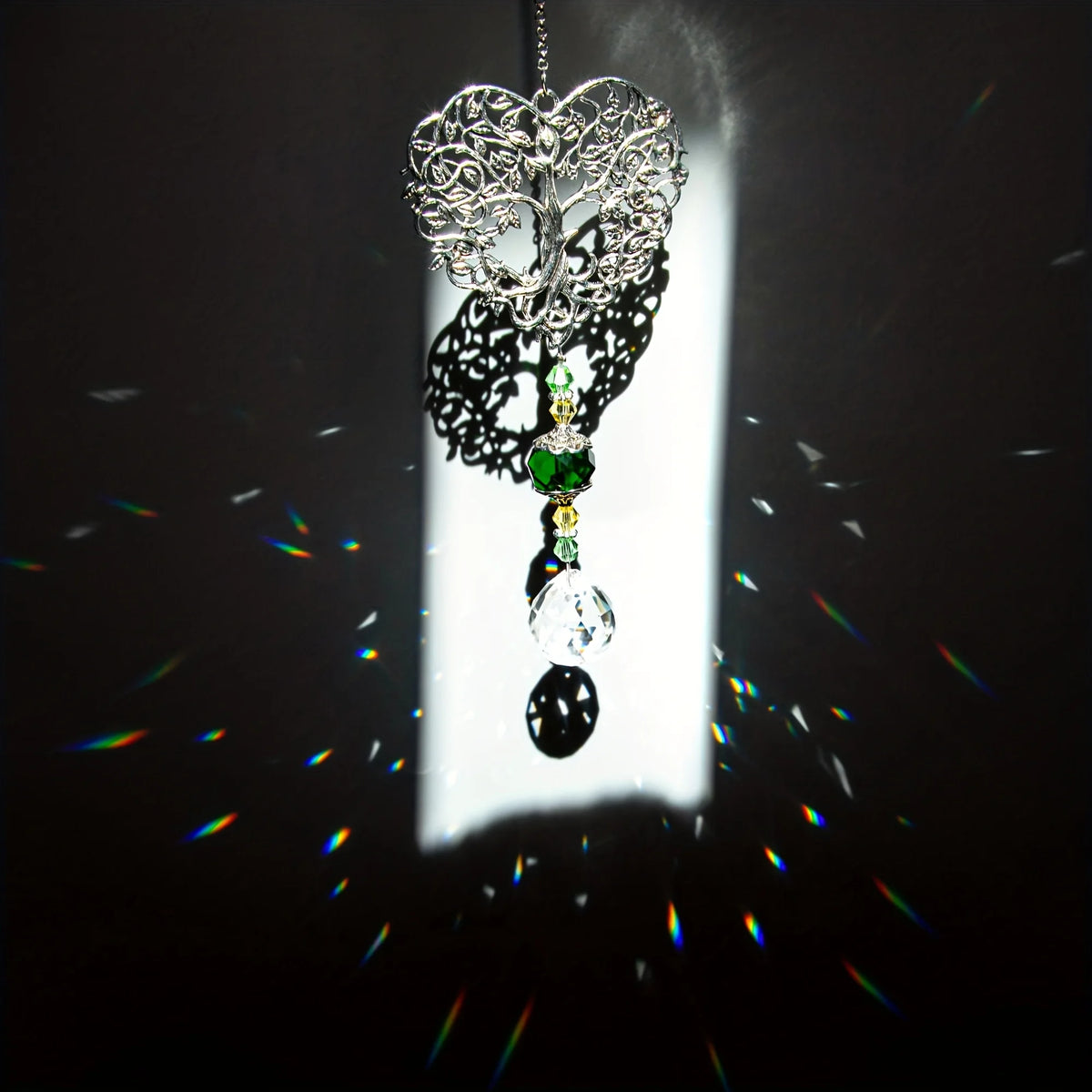 Silver crystal tree of life pendant with hanging green and clear gemstones