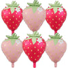 A set of six pink and red strawberry foil balloons for party decorations