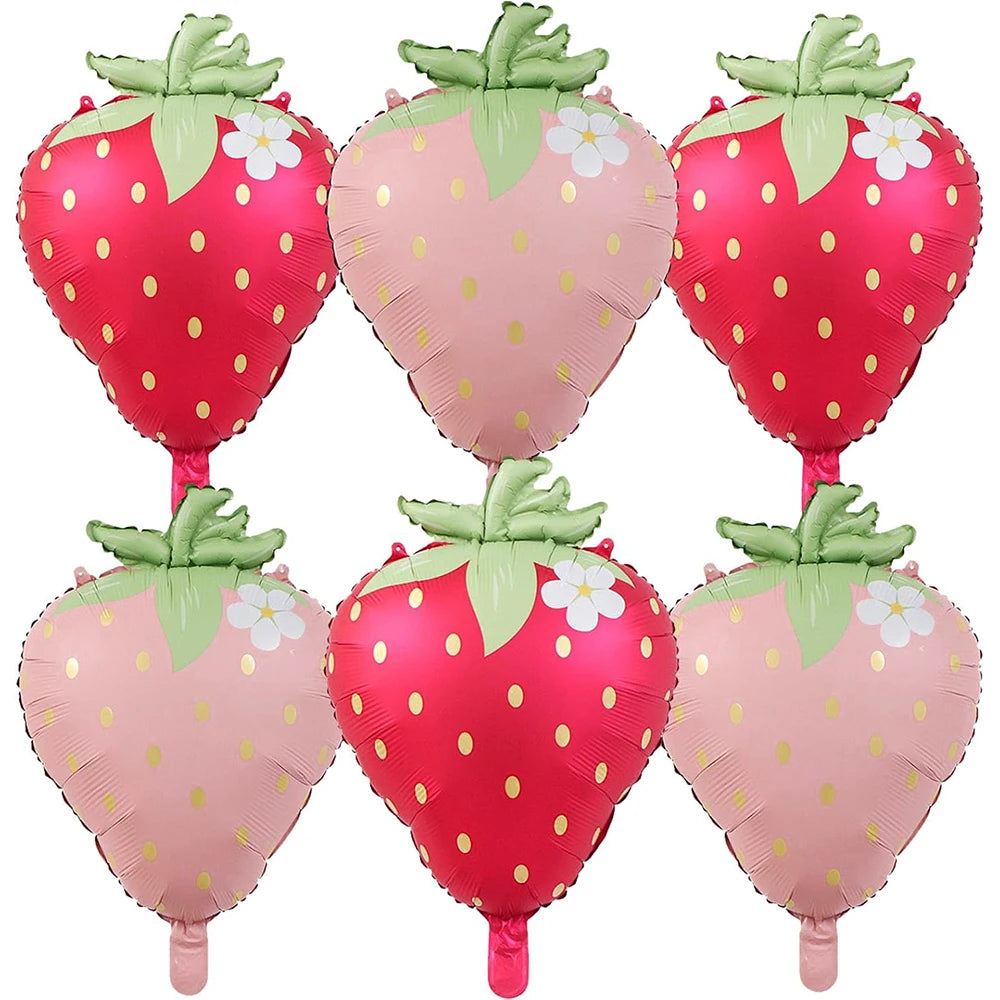 A set of six pink and red strawberry foil balloons for party decorations