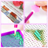 A collection of colorful beads and a diamond painting kit showing various colors and patterns.
