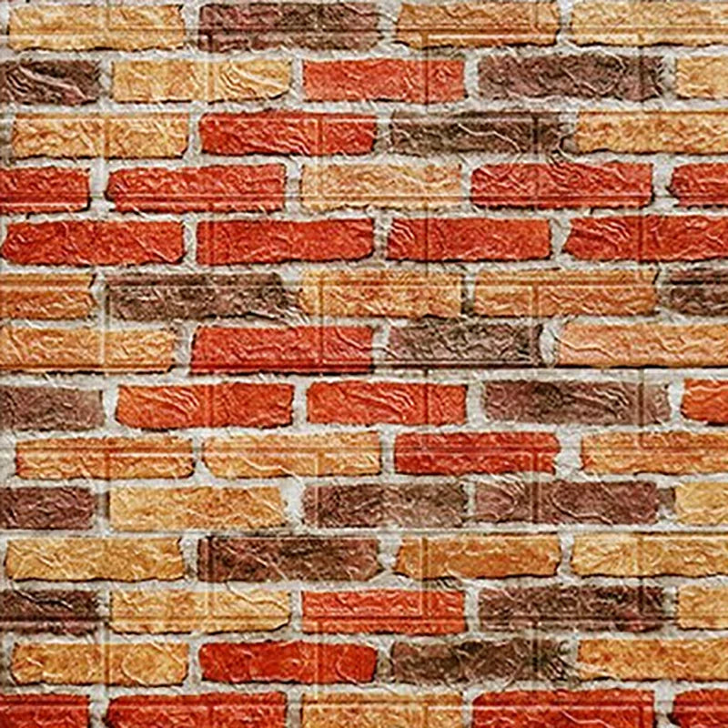 A textured brick wall made of multi-toned, self-adhesive 3D foam panels in shades of terracotta, brown, and beige.