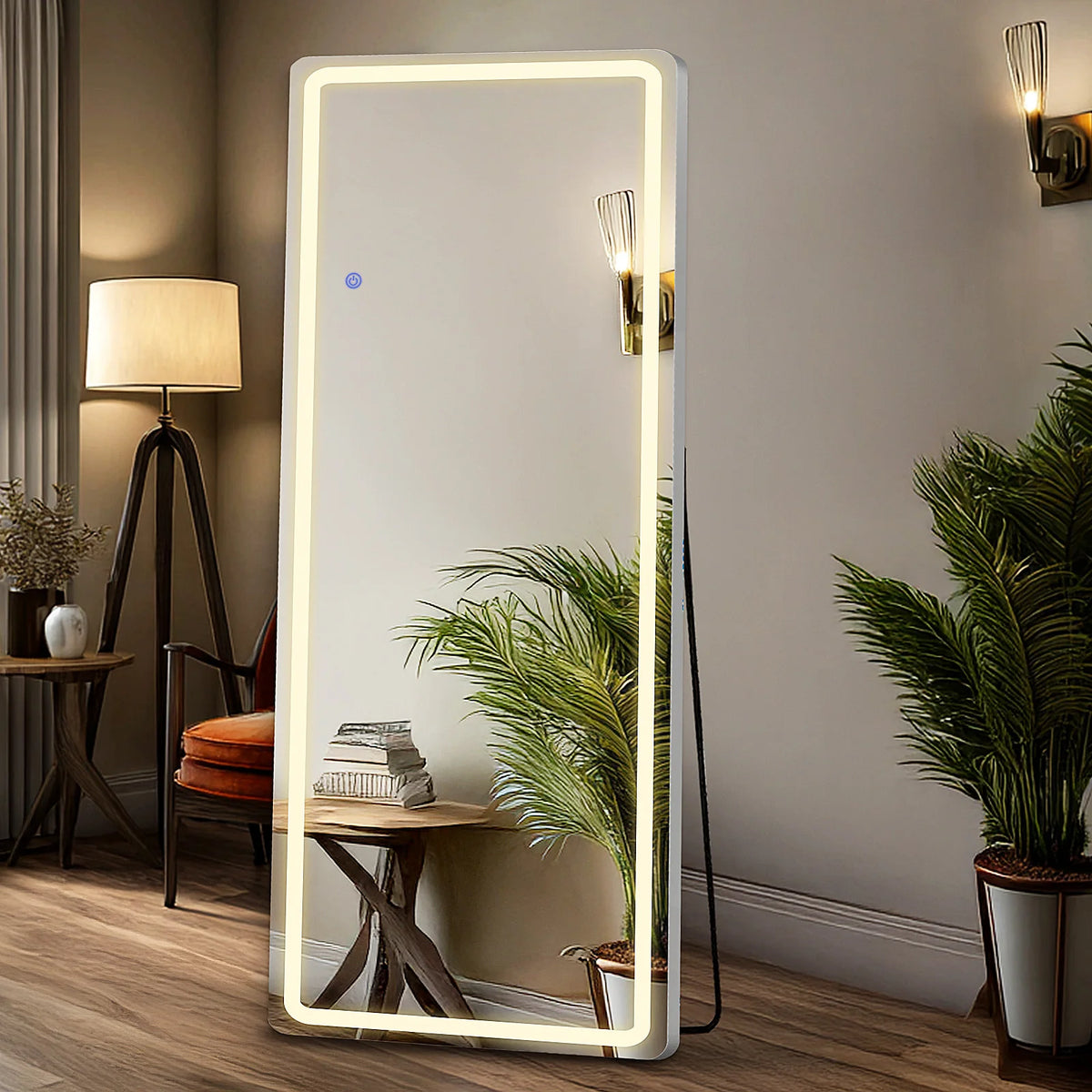 Miroir mural LED anti-bris avec cadre lumineux reflétant une pièce et une plante en pot.