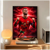 A framed poster of Cristiano Ronaldo celebrating, featuring a red shirt and intense expression.