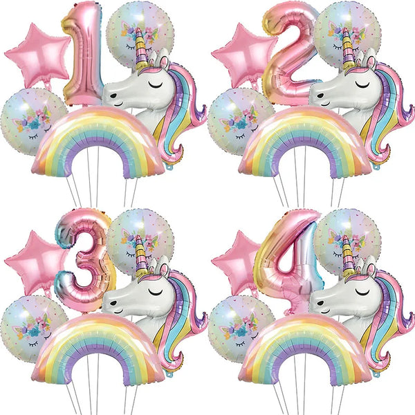 A set of rainbow unicorn foil balloons in pink, purple, and gold colors for a party decoration.