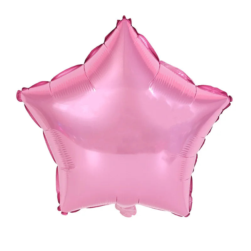 A pink foil balloon shaped like a star with a heart detail.