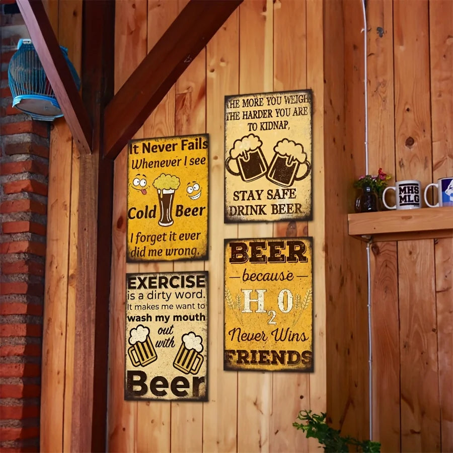 A set of four vintage metal signs featuring humorous pub art about beer and friends mounted on a wooden wall.