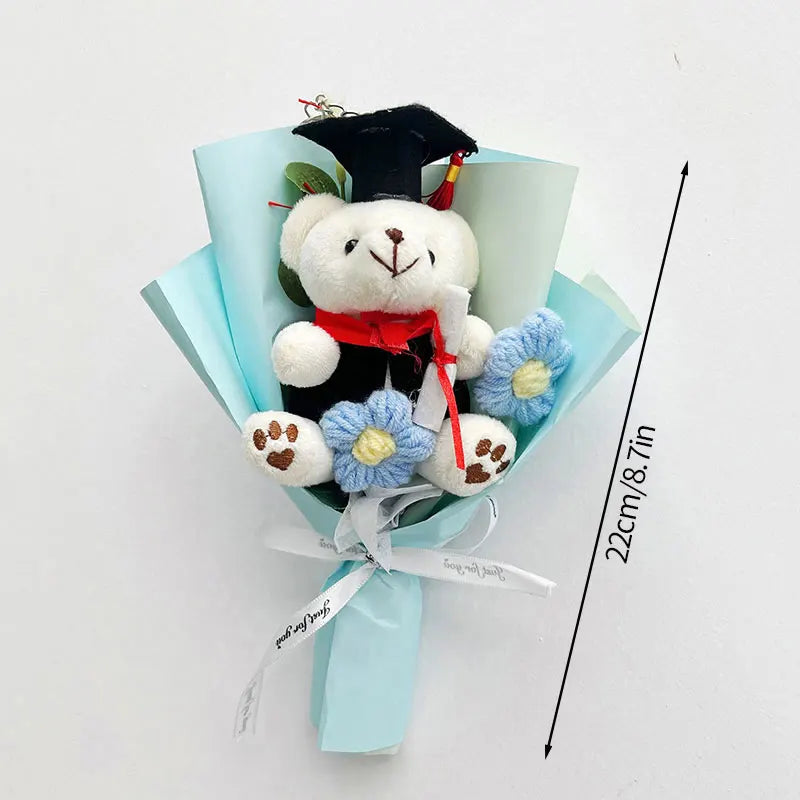 Handcrafted crochet flower bouquet featuring a teddy bear wearing a graduation cap and ribbon
