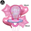 Pink foil balloons shaped like a baby bottle and star for baby shower decoration