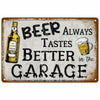 A vintage metal sign with text that reads Beer Always Tastes Better in the Garage and features a beer bottle and mug.