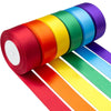A roll of satin silk ribbon in a rainbow gradient of colors, including red, orange, yellow, green, blue, and purple.