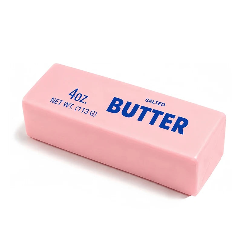 A pink rectangular butter squeeze toy labeled 4oz salted butter.