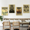 A gallery wall featuring posters of Radiohead album art in black and white tones.
