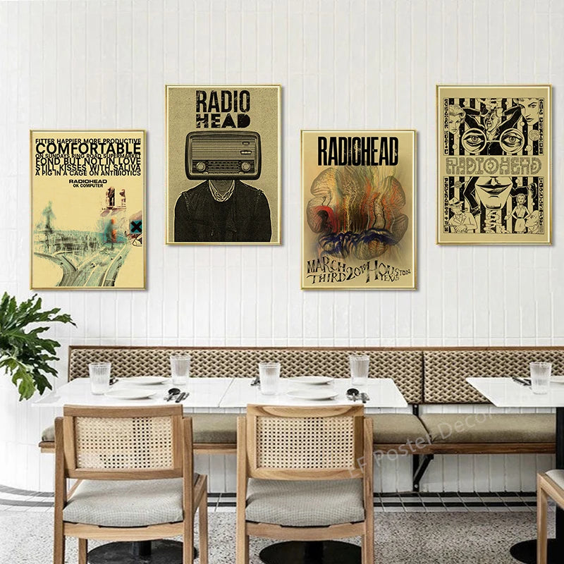 A gallery wall featuring posters of Radiohead album art in black and white tones.