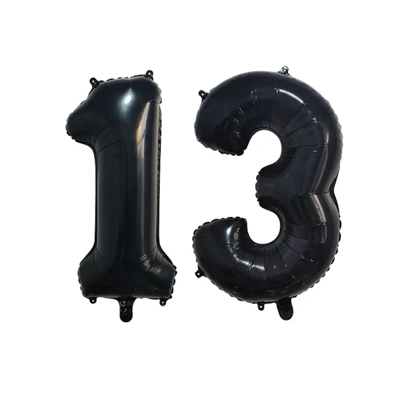 Black foil number balloon shaped like the number 13 for birthday party decor