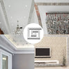 A set of 20 acrylic mirror wall stickers featuring a Greek key pattern used for home decor