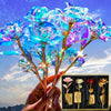 A hand holds a bouquet of iridescent gold foil artificial roses against a sunset sky.