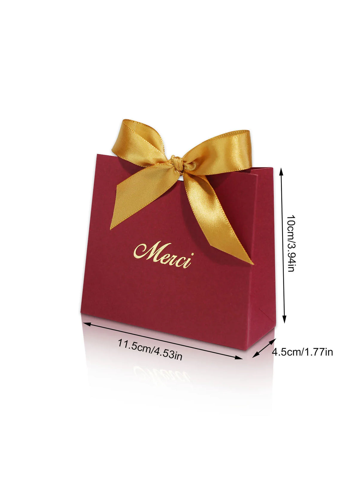 A red paperboard thank you gift bag tied with a gold ribbon.