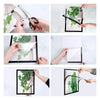 Hands display a magnetic display frame featuring diamond art and photos.