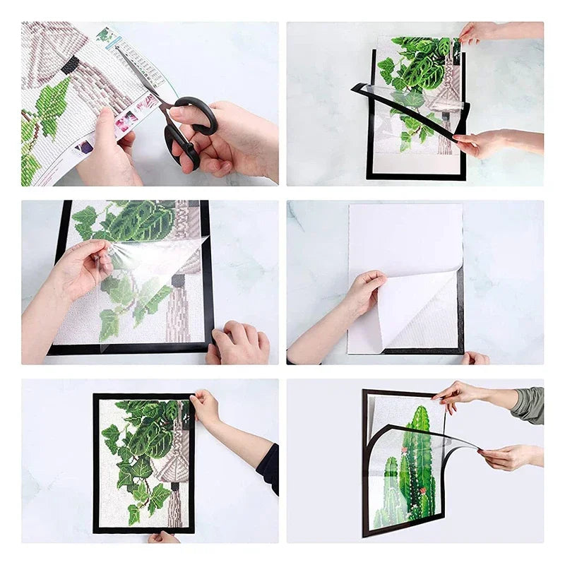 Hands display a magnetic display frame featuring diamond art and photos.