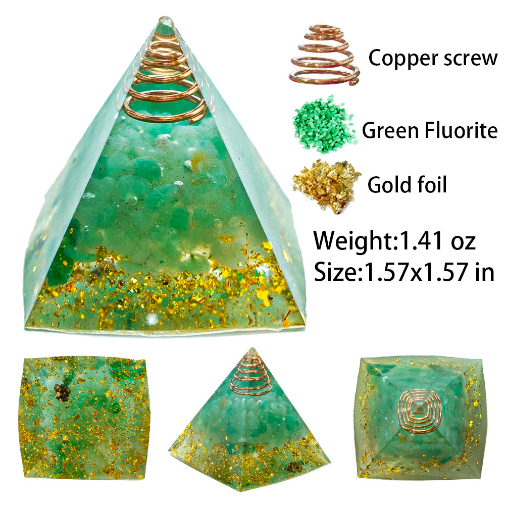 A green crystal pyramid made of fluorite and gold foil with a copper screw top.