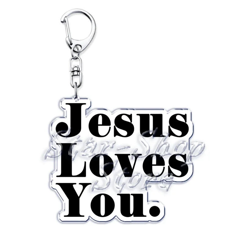 Silber-Acryl-Anhänger mit der Gravur „Jesus liebt dich“.