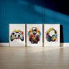 Three modern canvas wall art prints featuring gaming controllers and headphones with colorful paint splatters