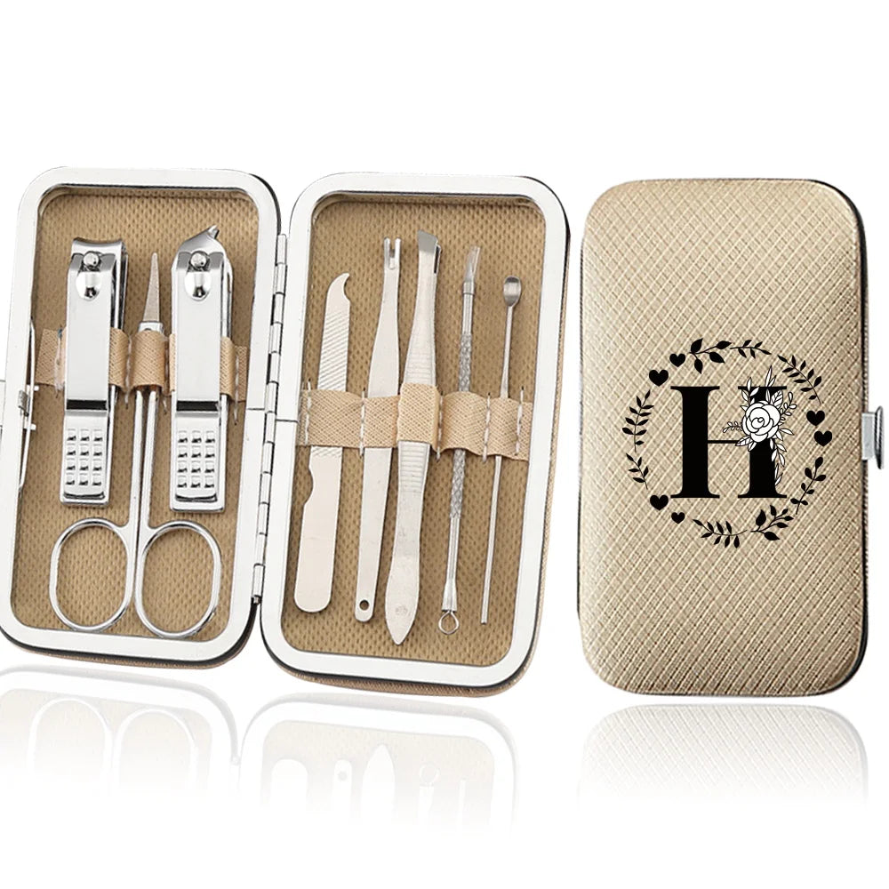 An open leather case displaying an 8-piece stainless steel manicure and pedicure kit with various tools.