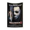 A black flag featuring a menacing close-up of Michael Myers and a child, promoting Halloween 5: The Revenge of Michael Myers.