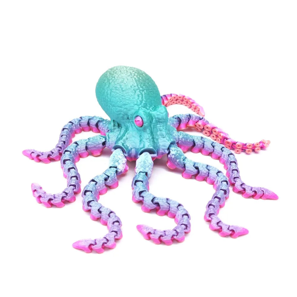 A vibrant teal and pink articulated 3D printed octopus figurine with eight tentacles.