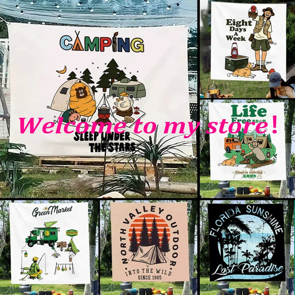 A collection of printed fabric flags and banners featuring camping, nature, and lifestyle themes.