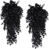 A pair of artificial eucalyptus leaf faux plants used for home decor.
