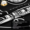 Close-up of a black and white striped polyester fabric showcasing a bohemian tapestry design.