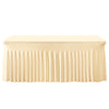 A beige elastic fitted spandex tablecloth draped in vertical pleats for a rectangular table.