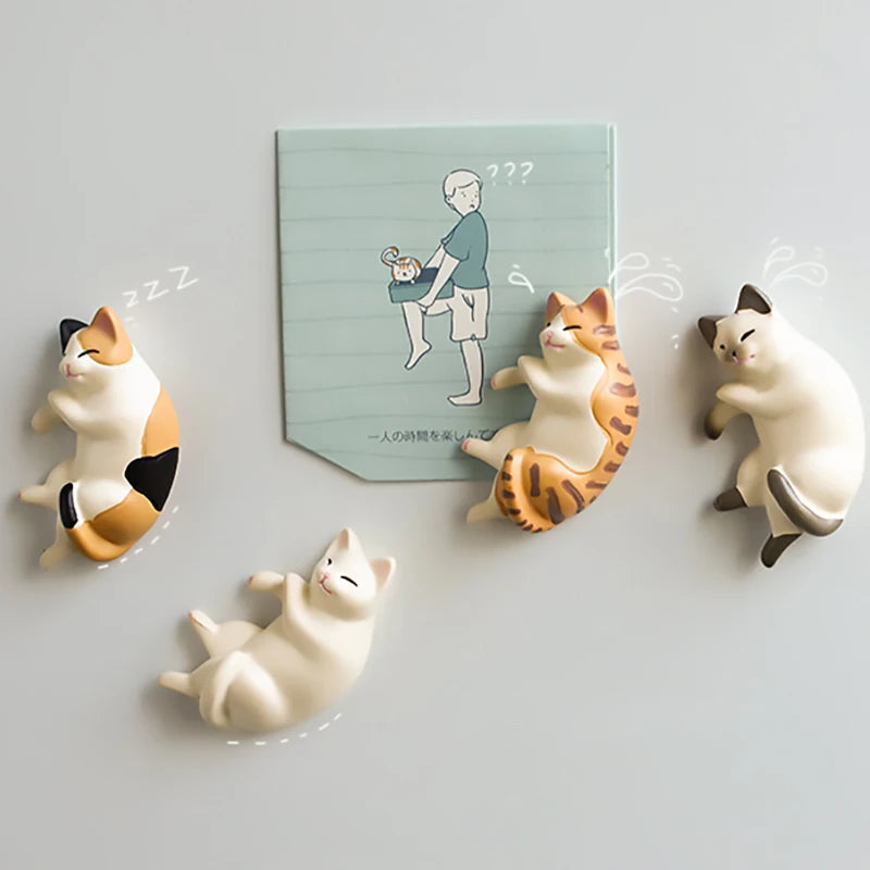 A set of six white and orange cat designs on a light blue card, featuring cats in various poses.