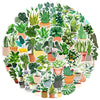 A circular arrangement of various potted green plants and succulents.