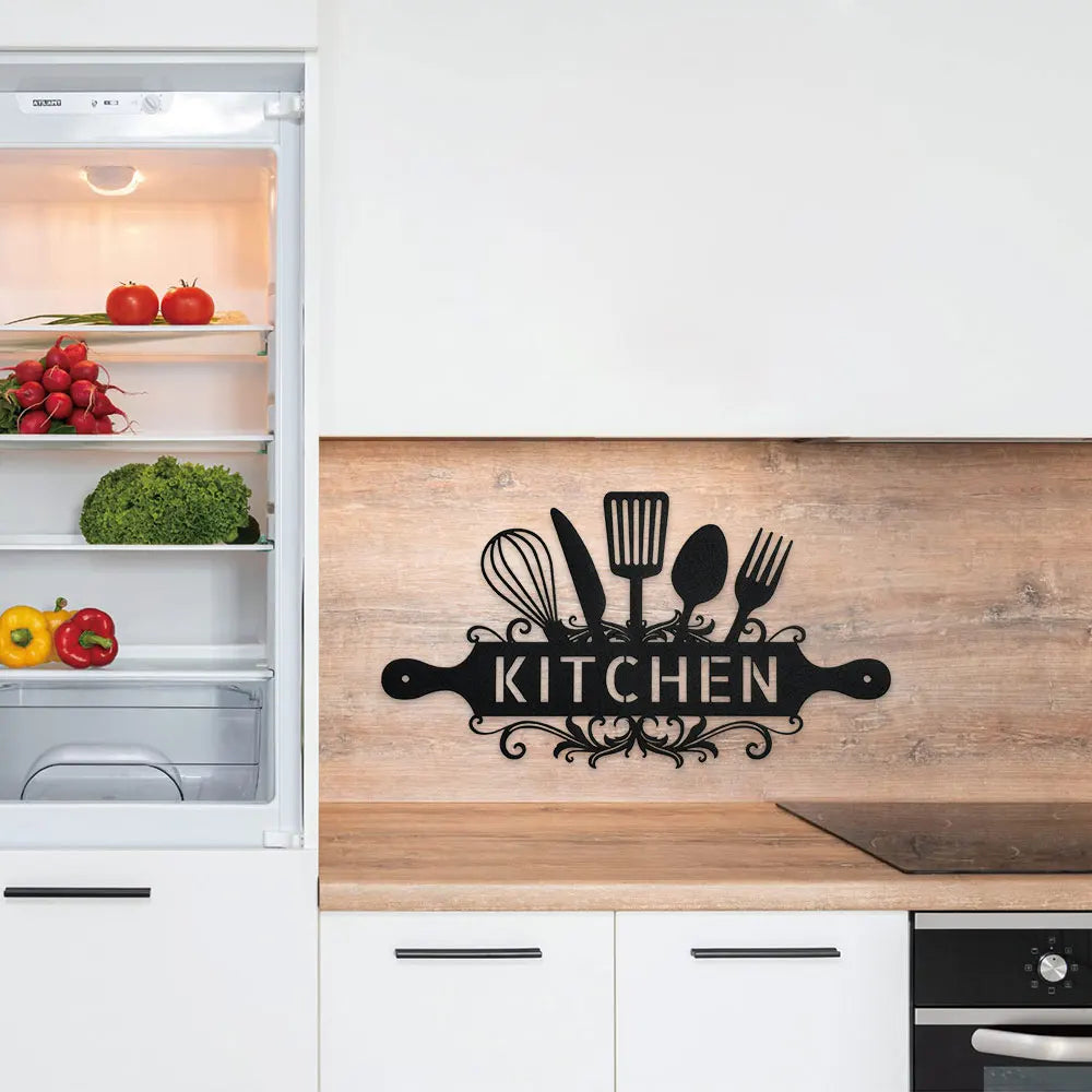Rustic farmhouse metal wall sign featuring kitchen utensils on a wooden backsplash.