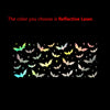 A collection of colorful bat silhouettes against a black background.