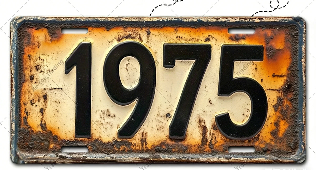 Letrero de aluminio vintage con el año 1975 grabado en una superficie envejecida.